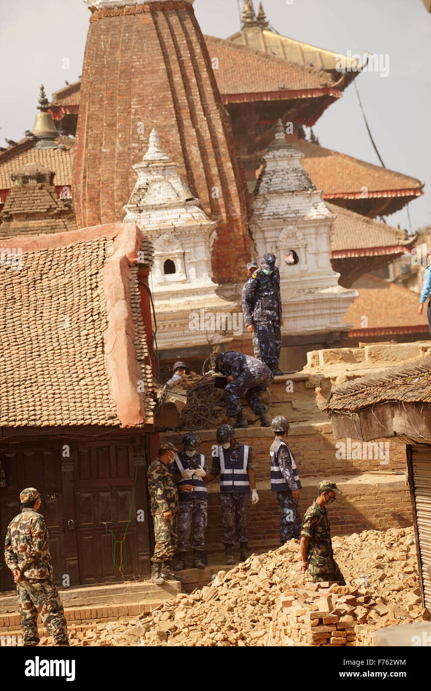 Army and police personnel clearing debris damaged, krishna temple, nepal earthquake, asia Stock Photo