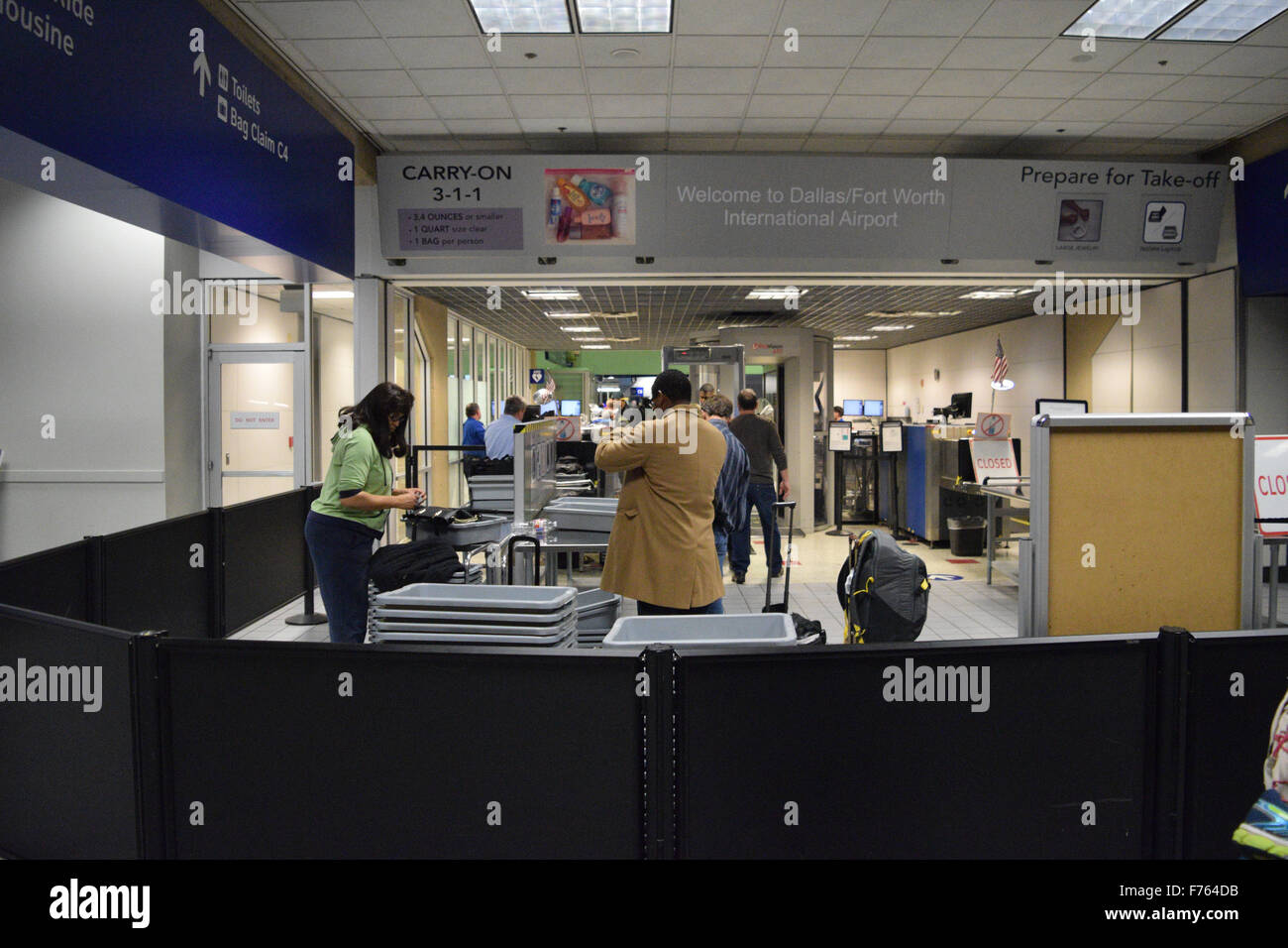 Dallas, Texas, USA. 25th Nov, 2015. TSA agents at DFW International Airport in Dallas checking passengers before they enter the airport concourse. Credit:  Brian T. Humek/Alamy Live News Stock Photo
