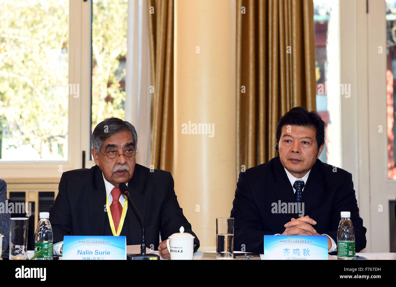 (151126) -- BEIJING, Nov. 26, 2015 (Xinhua) -- Nalin Surie (L), director general of the Indian Council of World Affairs, and Qi Mingqiu, vice chairperson of China Soong Ching Ling Foundation, attend the China-India Friendship and Inter-Civilization Exchanges Roundtable Conference in Beijing, capital of China, Nov. 26, 2015. The conference was held to mark the 65th anniversary of the establishment of the diplomatic relations between China and India. (Xinhua/Jin Liangkuai) (ry) Stock Photo