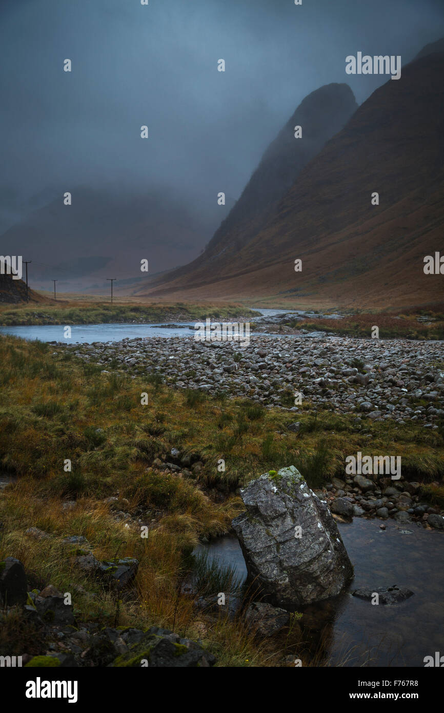 Low cloud and mist with autumn colours in Glen Etive, Lochaber, Scotland Stock Photo