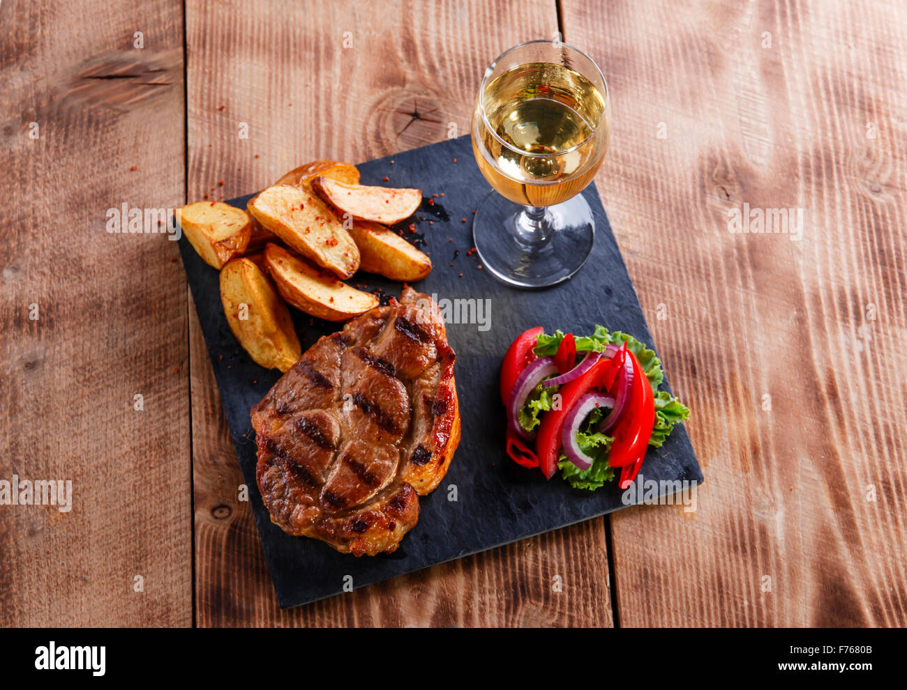 Roast pork steak potatoes hi-res stock photography and images - Alamy