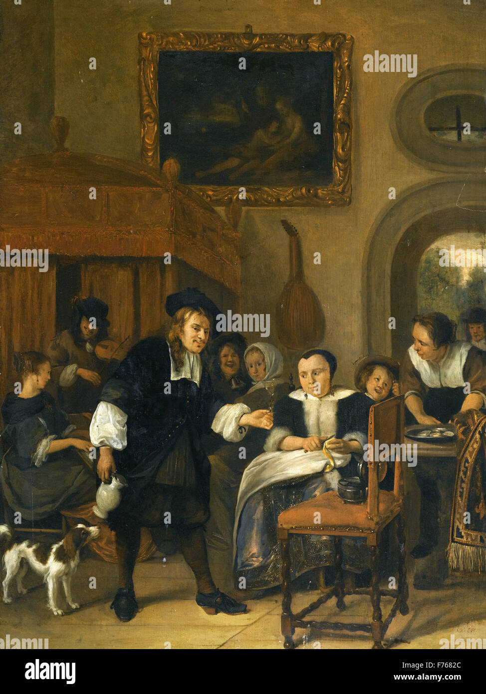 Jan Steen - A Gentleman Offering a Lady a Glass of Wine with a Couple making Music and other Townsfolk in an Interior Stock Photo