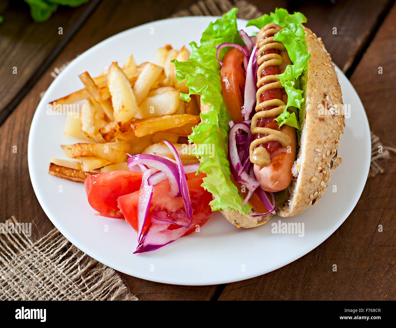 Hot Dogs sandwich with French fries on white plate Stock Photo Alamy
