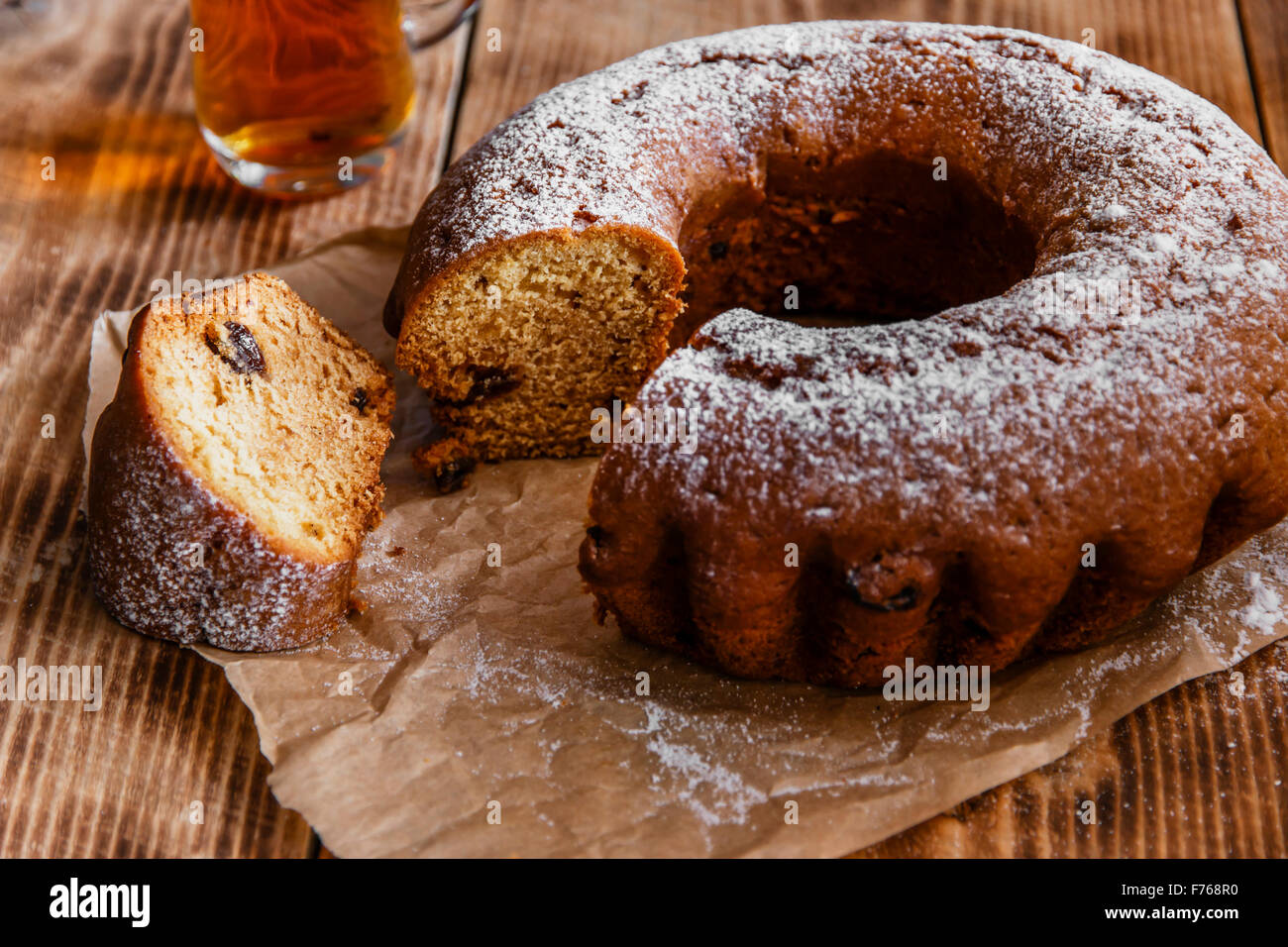 bake ring cake with icing sugar sliced Stock Photo Alamy