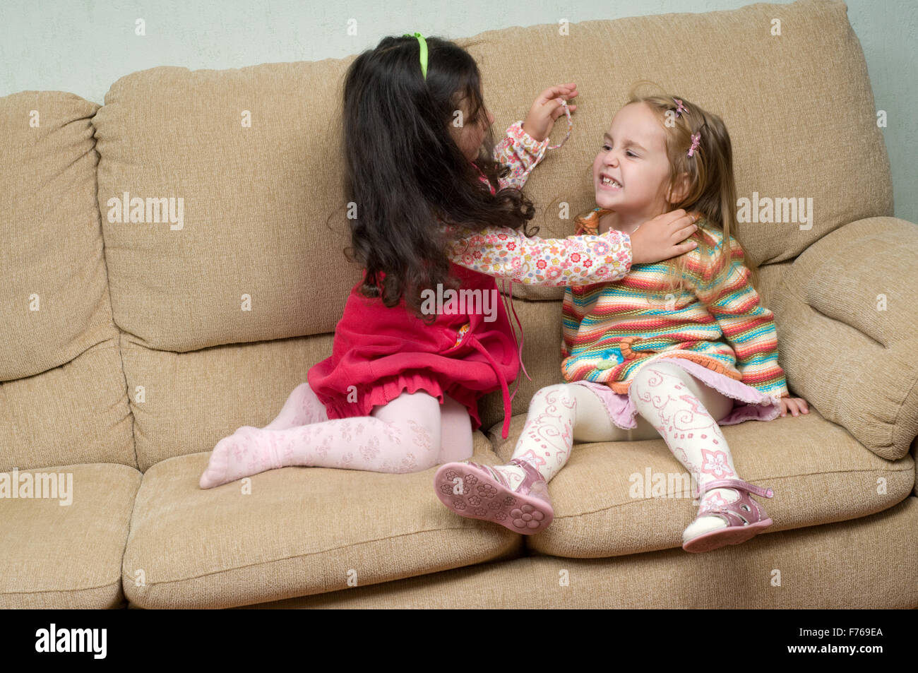 two little girls conflicting Stock Photo