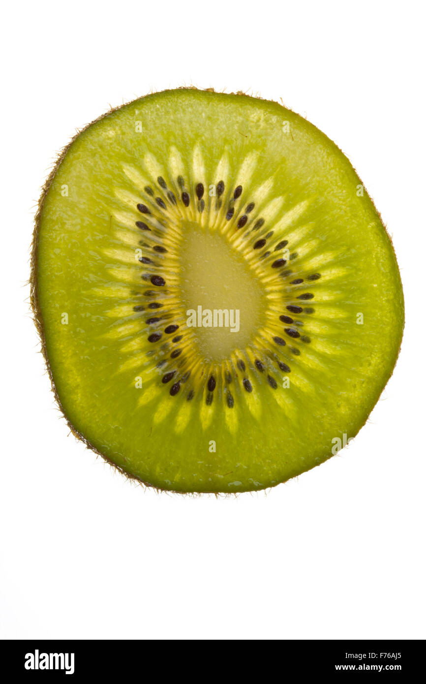 closeup of a translucent slice of kiwi Stock Photo