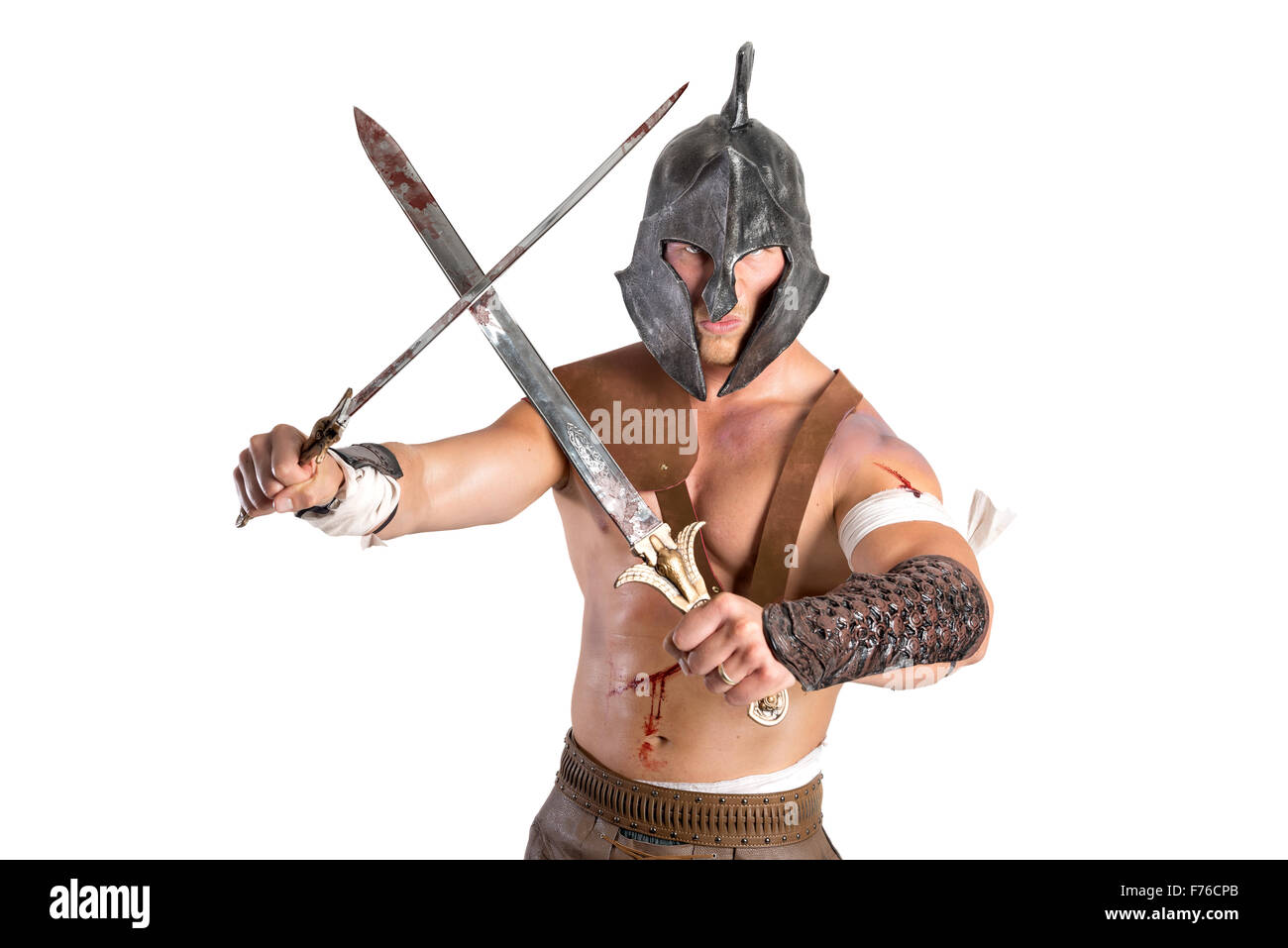 Gladiator posing isolated in a white background Stock Photo - Alamy