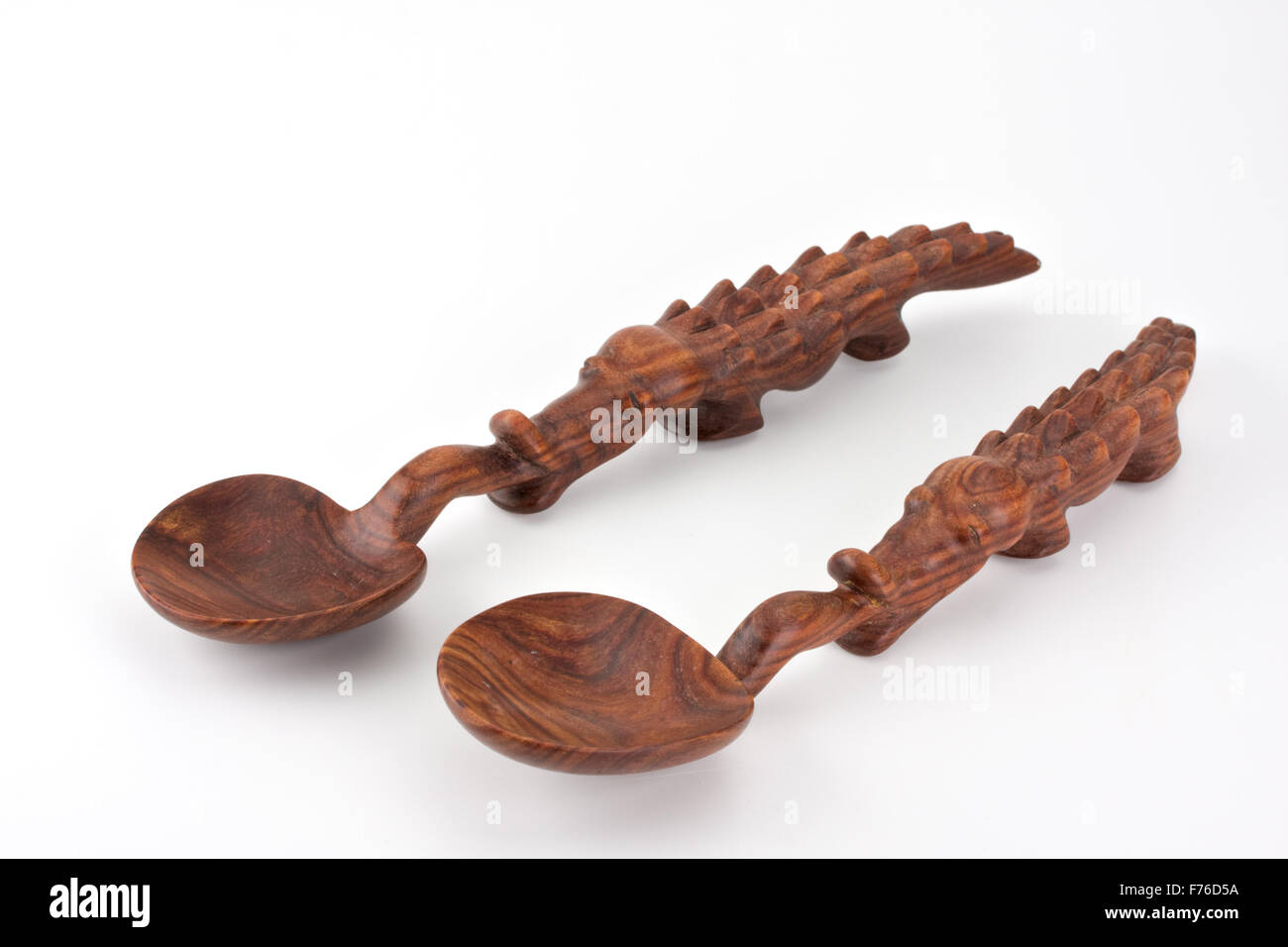 a carved spoon in the shape of a crocodile Stock Photo - Alamy