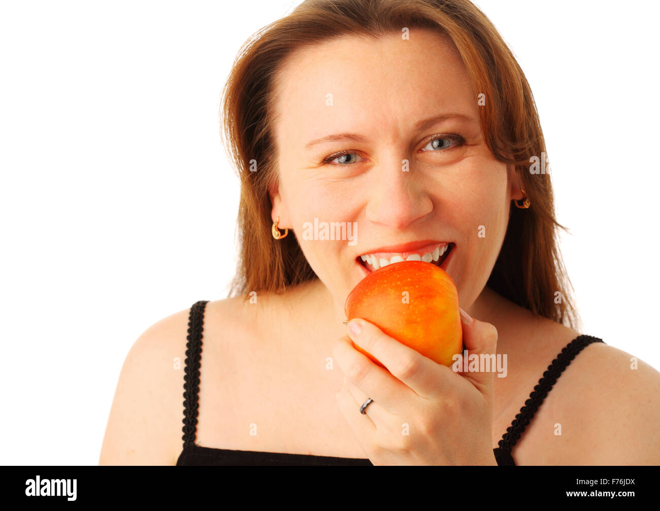 Young woman eating an apple Stock Photo Alamy
