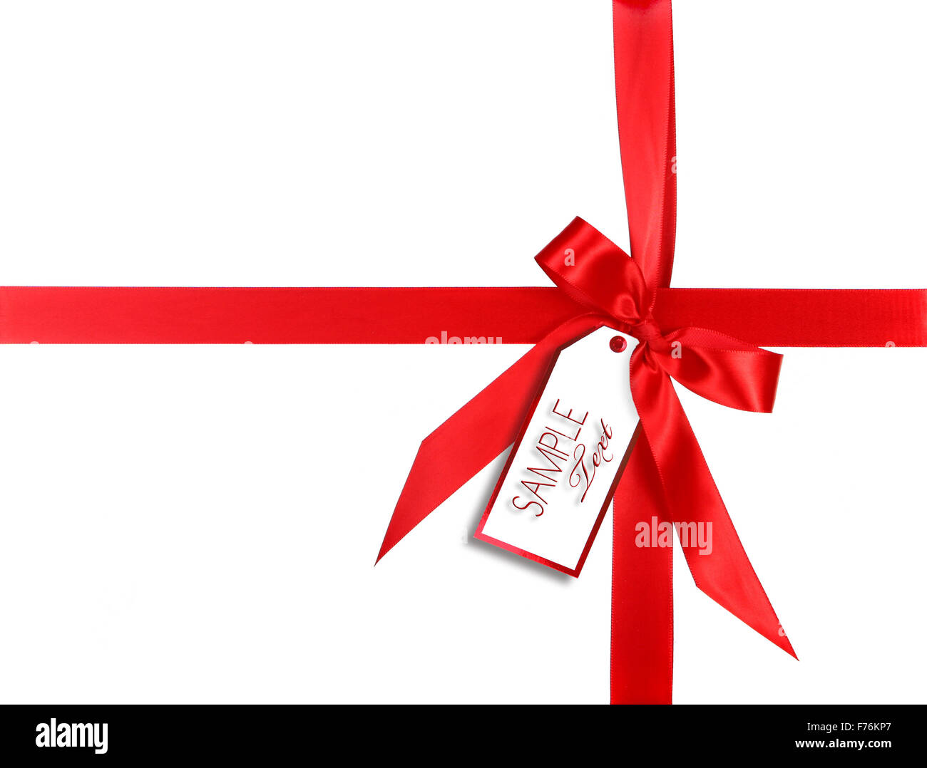 Red Wrapped Rippon Red Gift Wrapped WIth Ribbon and Tag Stock Photo - Alamy