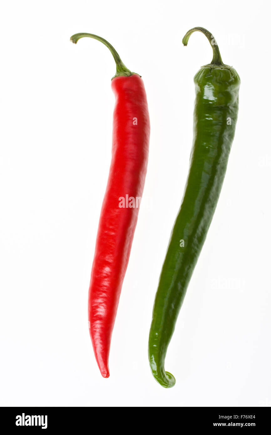 red and green hot chilli peppers on white background Stock Photo