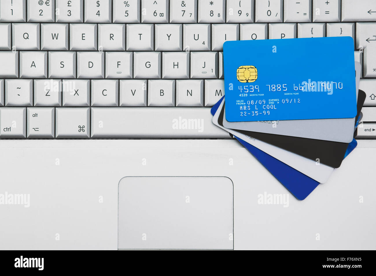 A Group off credit cards and bank cards on a Mobile Computer lap Stock ...