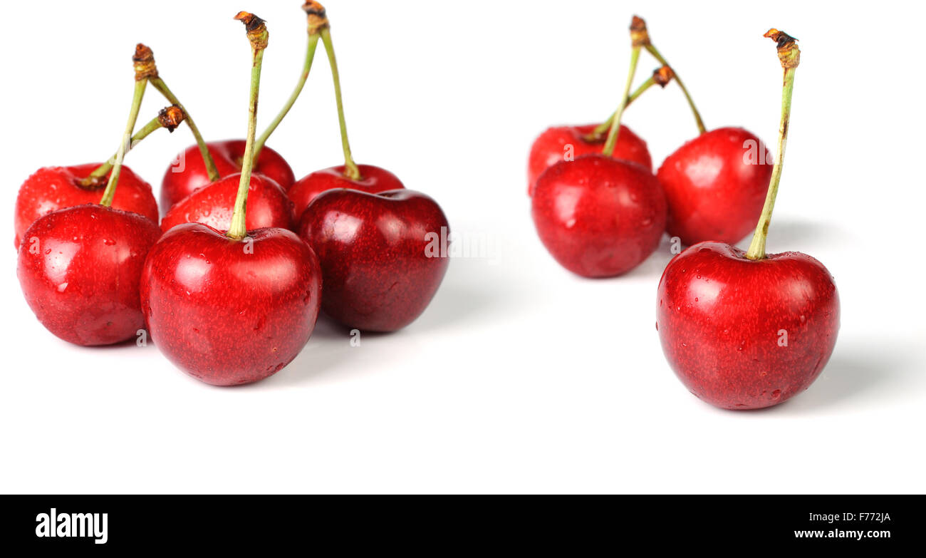 Ripe, juicy red cherries on a white background Stock Photo