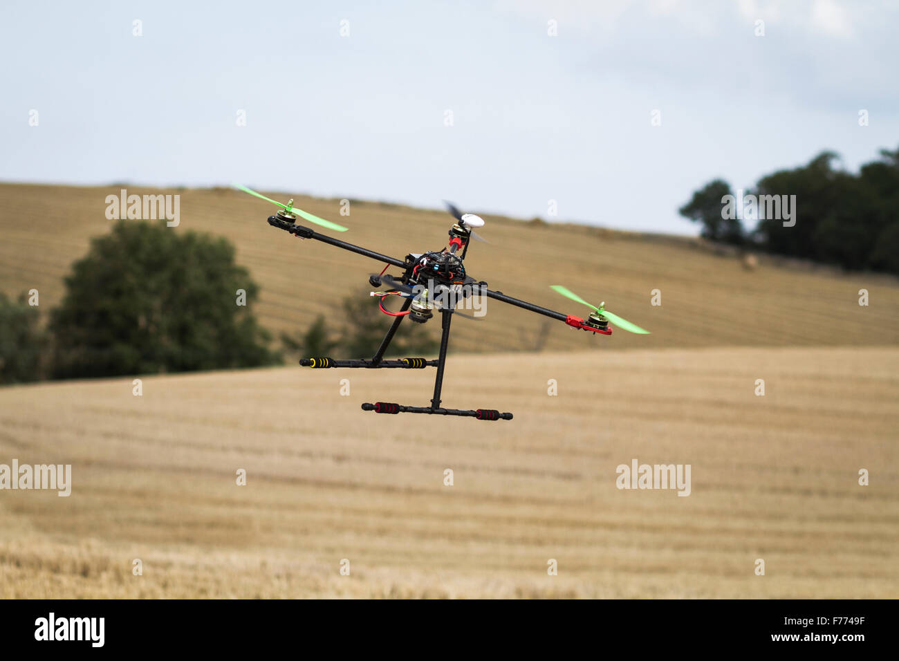 Quadcopter in flight Stock Photo - Alamy