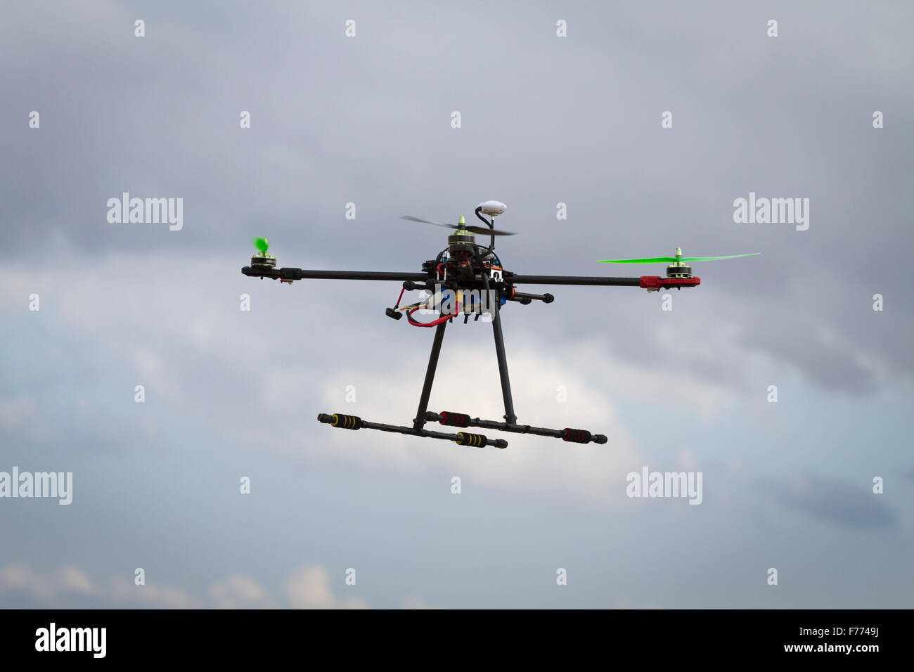 Quadcopter in flight Stock Photo