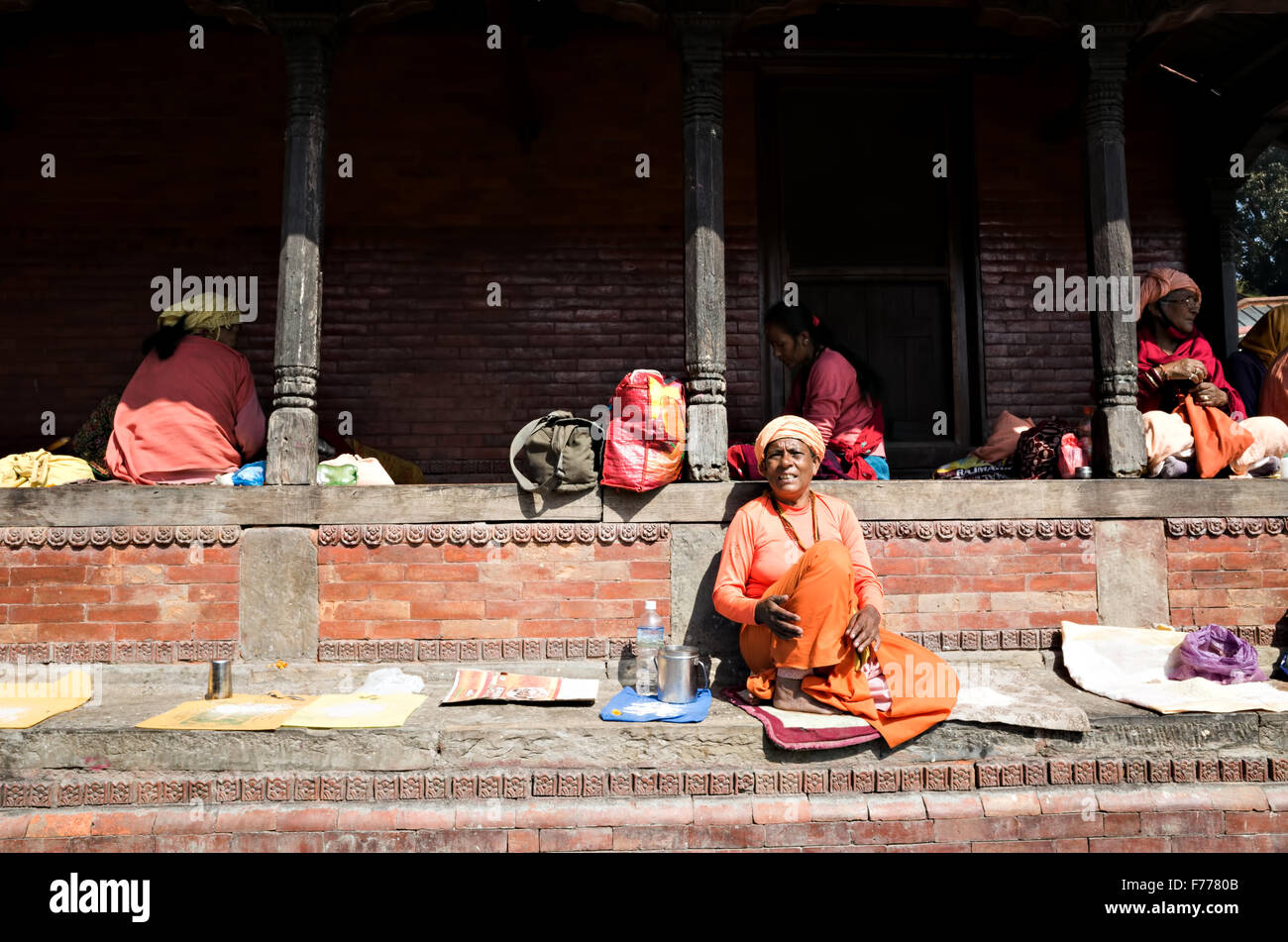 holy women at rest in Pashupatinath temple complex, Kathmandu Stock Photo