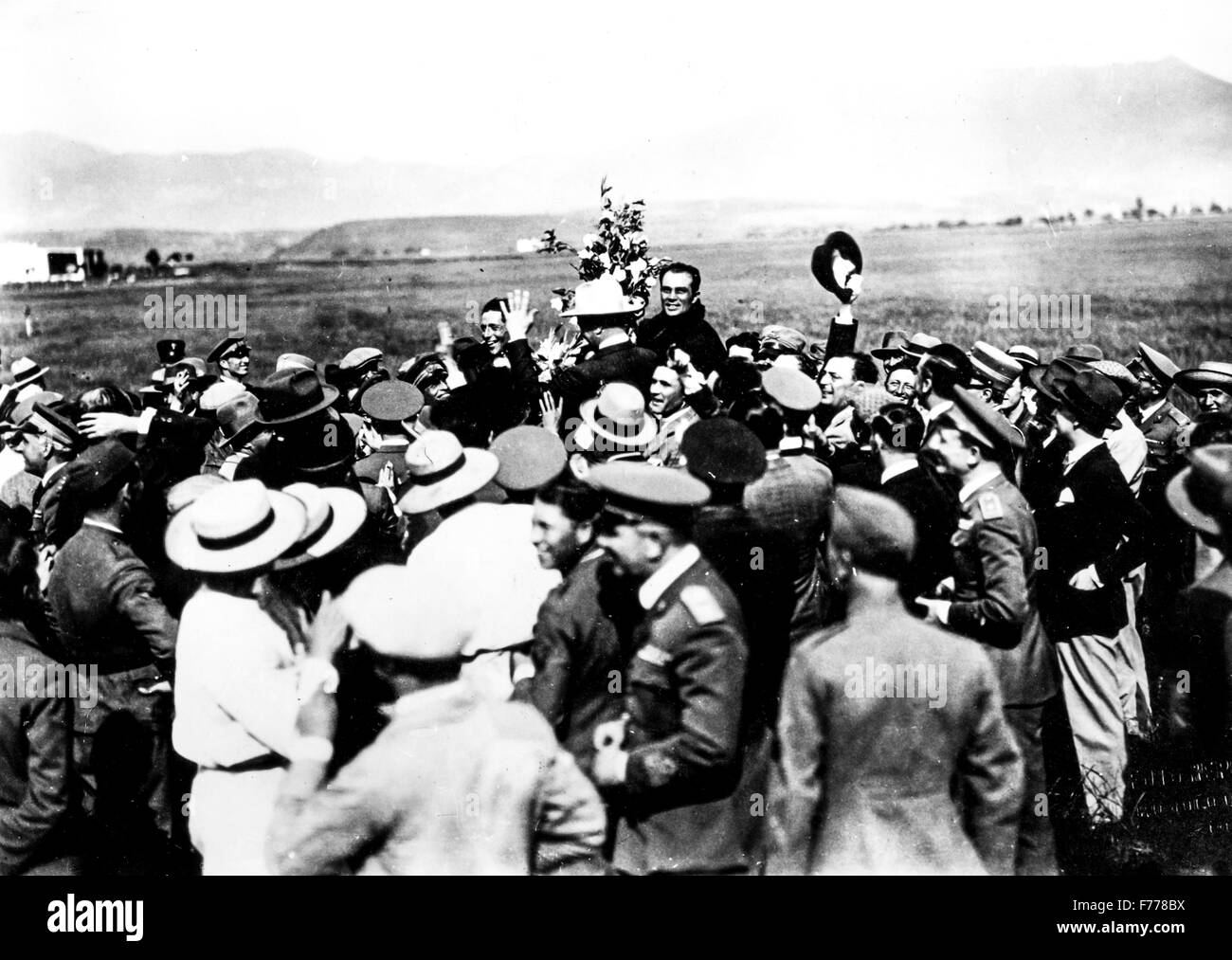 Ferrarin and Del Prete are carried in triumph by the crowd after completing his world record of   duration,Rome 1928 Stock Photo