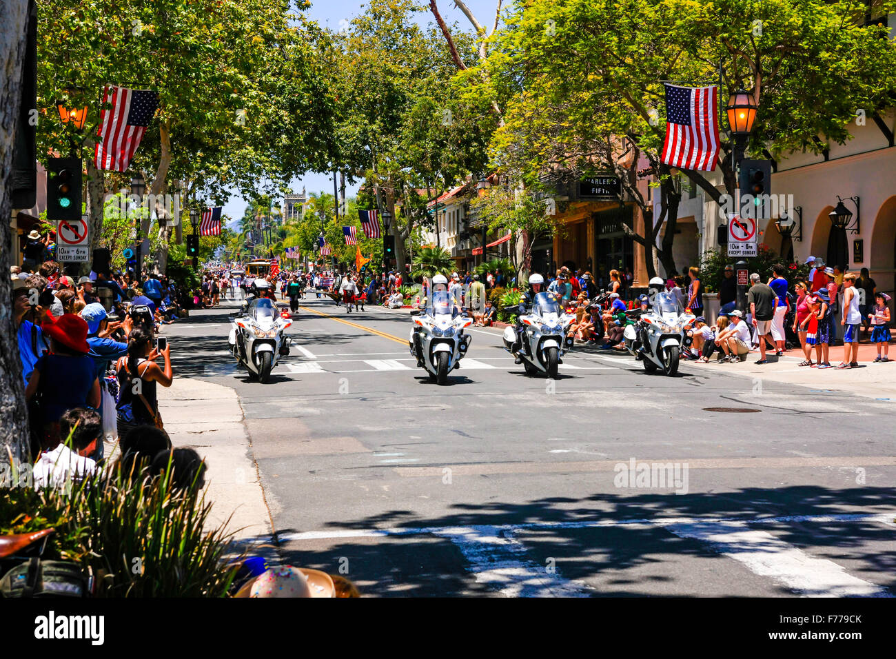 Californian Police motorcyclists lead the July 4th parade down State