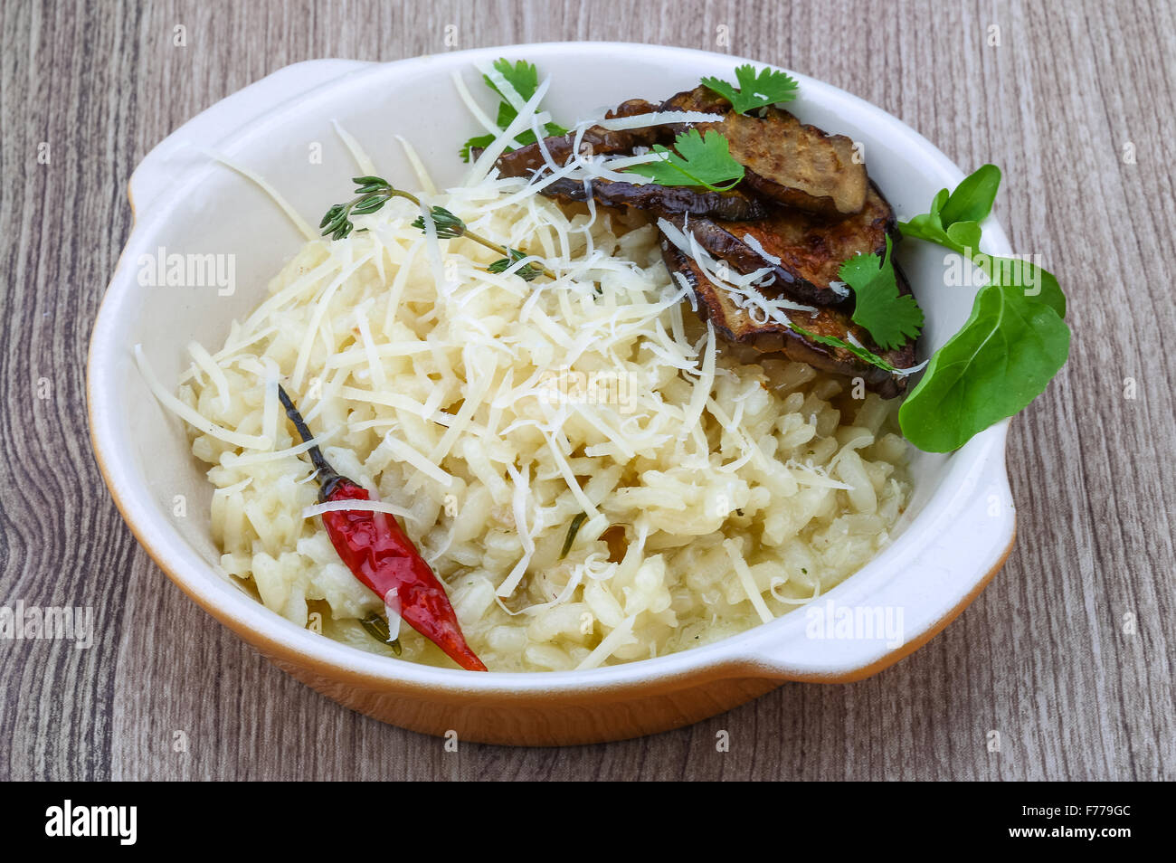 Italian trditional Risotto with eggplant and coriander Stock Photo Alamy