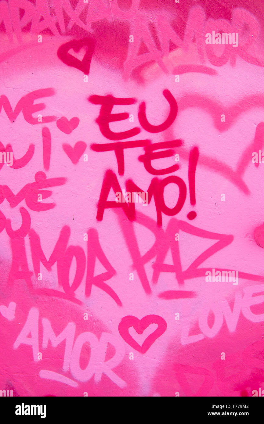 International Love And Peace Graffiti In English And Brazilian Portuguese Writing On Pink Wall In Rio De Janeiro Brazil Stock Photo Alamy