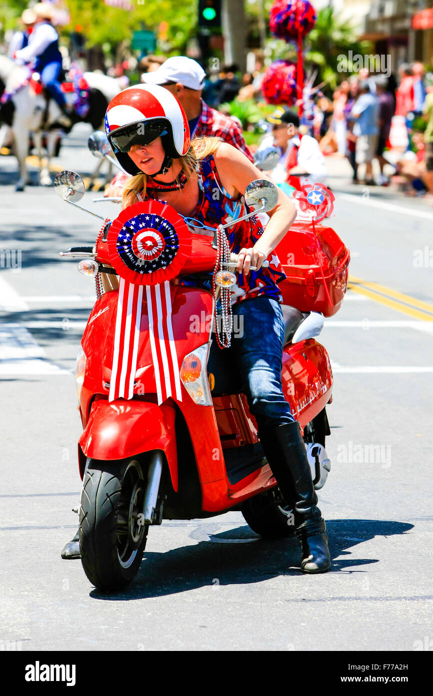 The Italian scooter group show their patriotic fever at the July 4th parade in Santa Barbara