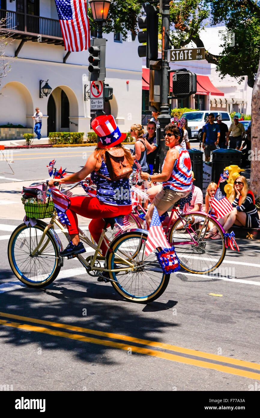 Patriotic people on bicycles celebrating July 4th in Santa Barbara, California Stock Photo