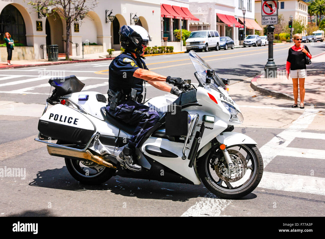 Santa Barbara Police Dept motorcycle and rider on State street Stock