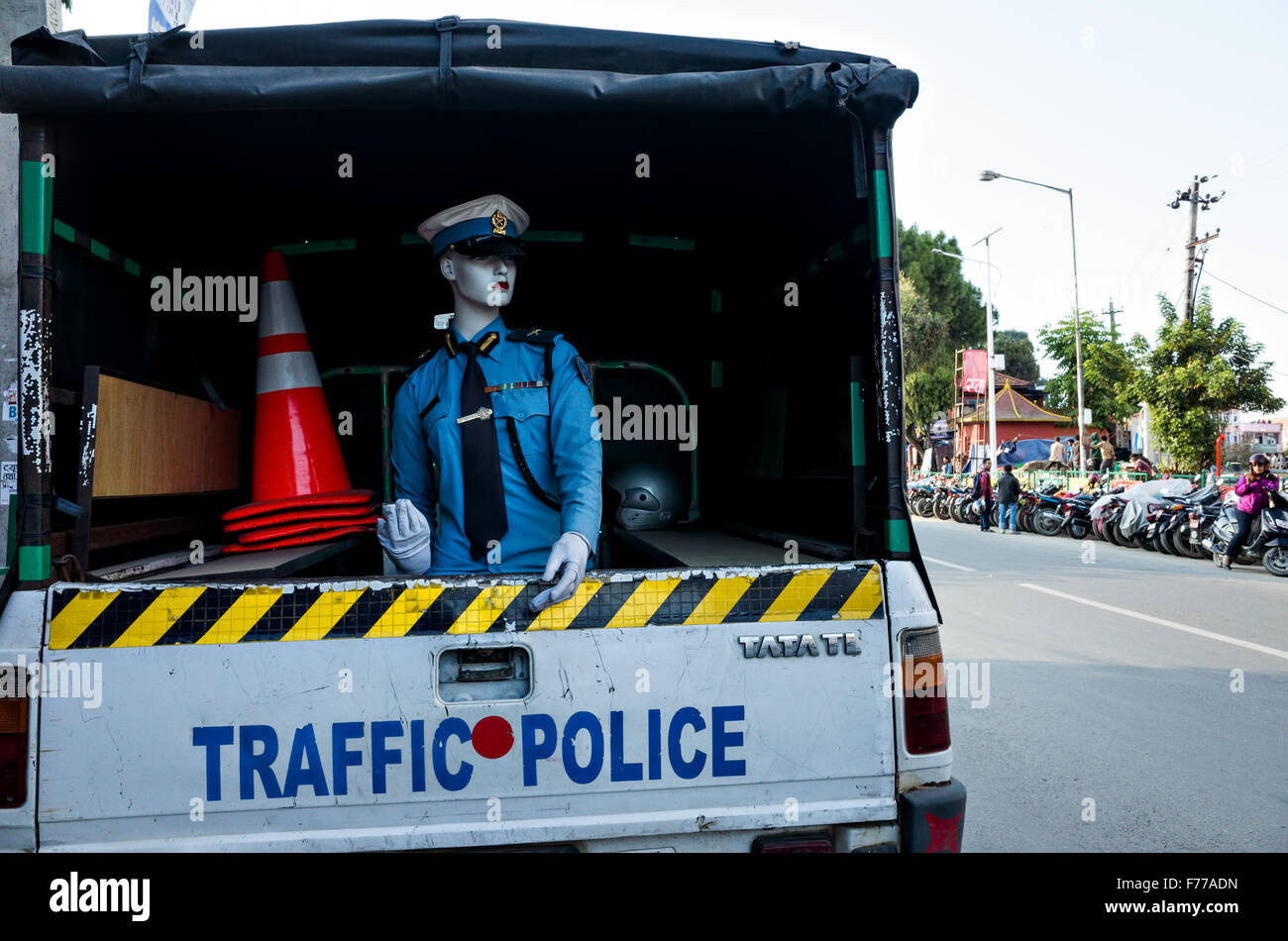 a mannequin with a lady's traffic police uniform of Nepal kept in a pick up truck, Pulchowk, Laitpur, 2015, Nepal Stock Photo