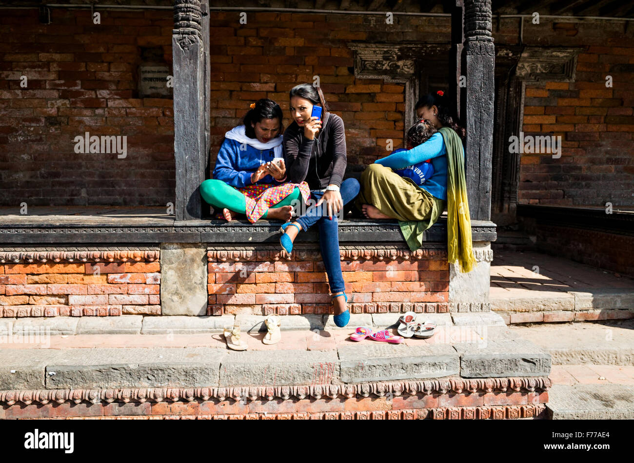 women at a rest house in Pashupatinath temple complex, 2015, Kathmandu, Nepal Stock Photo