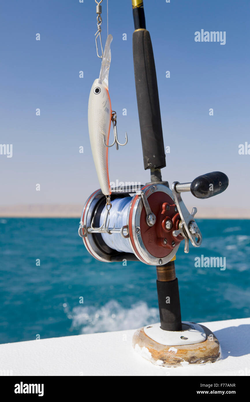 Trolling rods and reels used for offshore and deep sea fishing near Port  Aransas Texas Stock Photo - Alamy