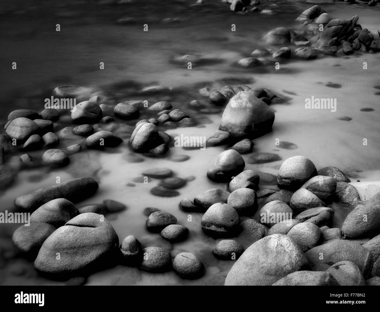 Boulders on beach shore of Lake Tahoe, Nevada Stock Photo