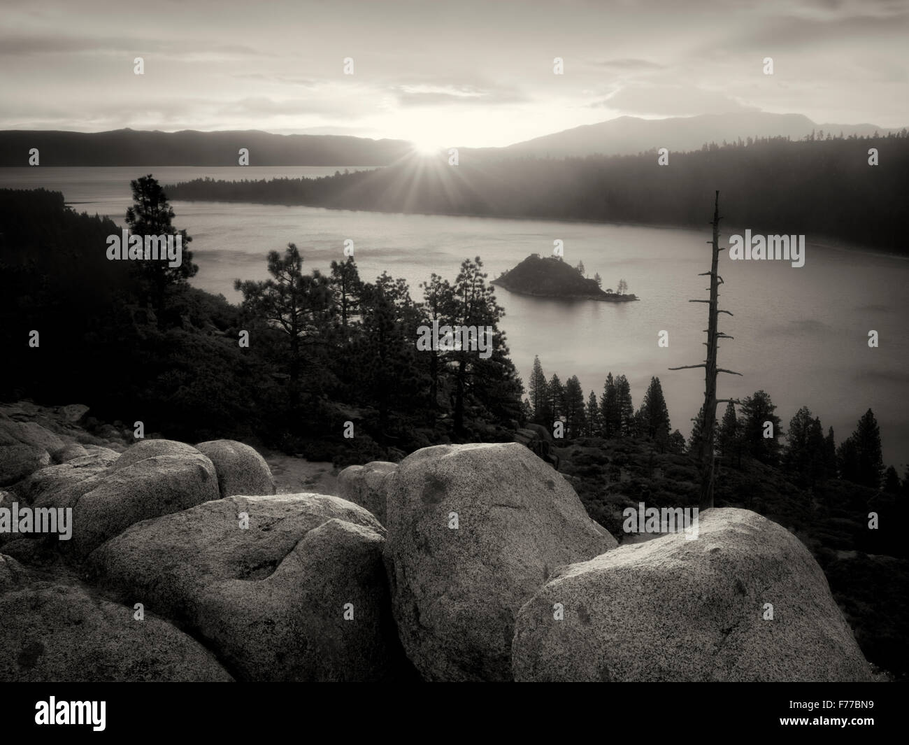 Sunrise and granite boulders at Emerald Bay, Lake Tahoe, California Stock Photo