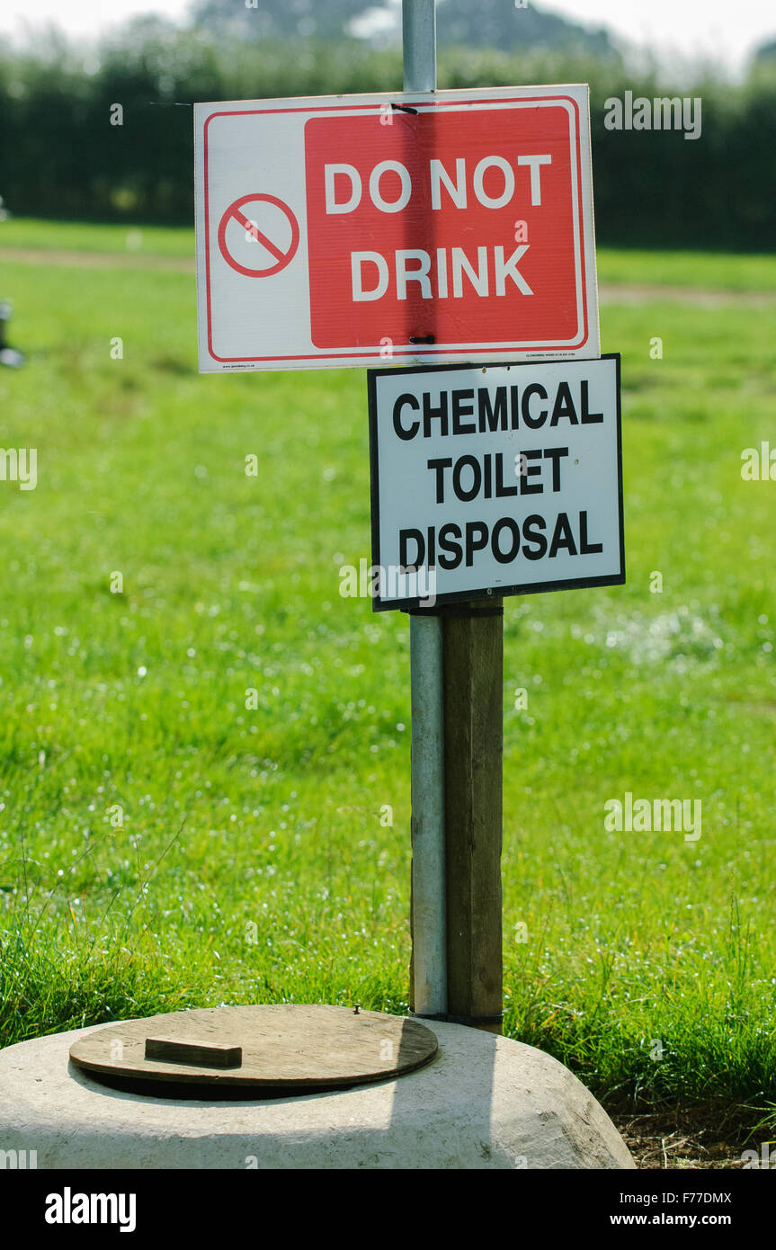 Funny 'Do Not Drink' and 'Chemical Disposal' sign in Silverstone woodlands. Stock Photo