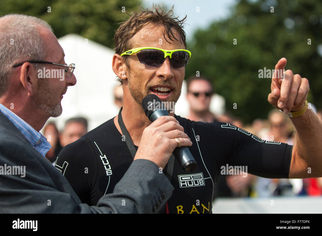 Post race interview by Andy Potter, of BBC Radio Derby, with Jenson Button at the Jenson Button Trust Triathlon 2015 Stock Photo