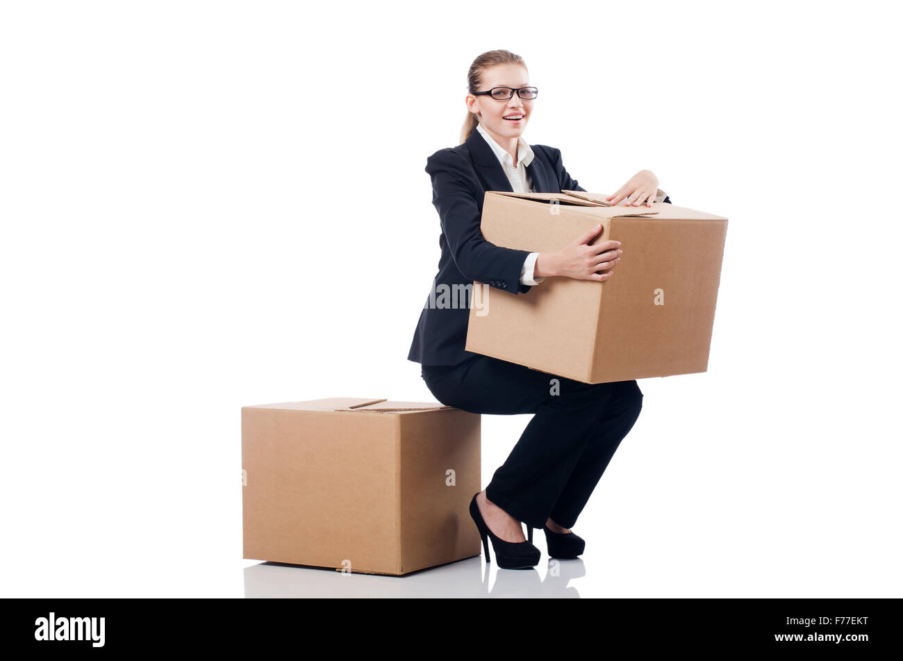 Woman businesswoman with boxes on white Stock Photo - Alamy