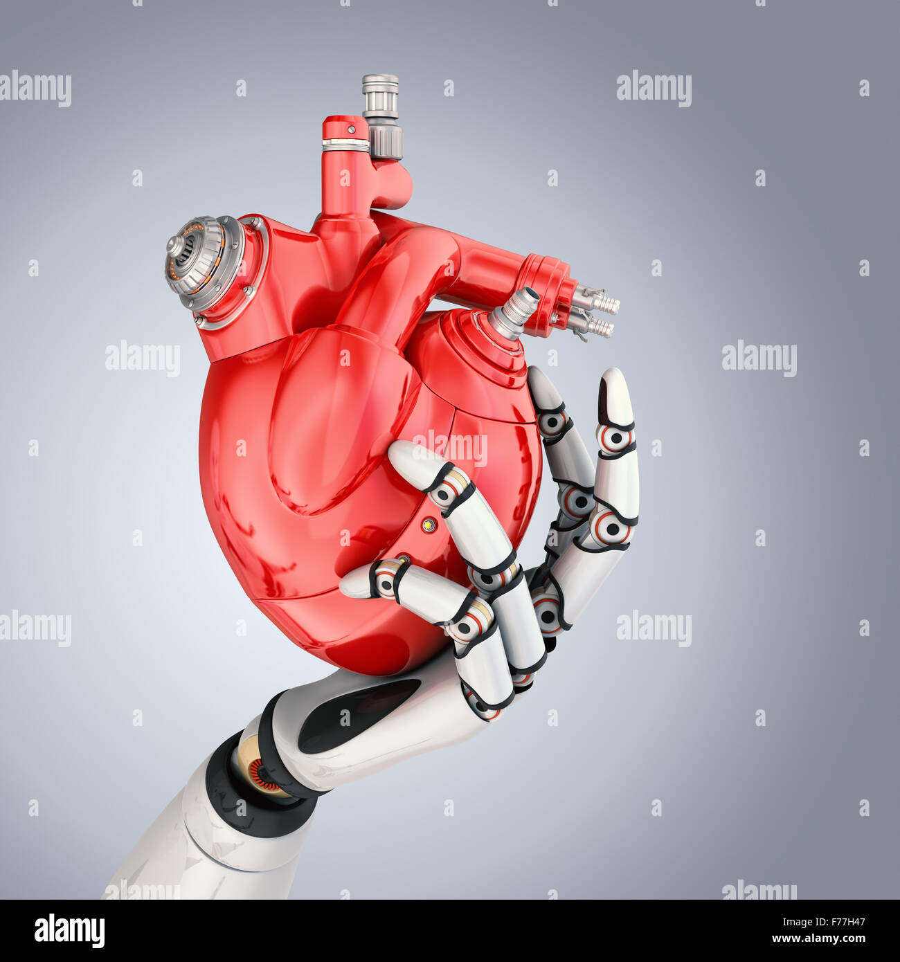 Mechanical heart in robots hand. Clipping path included Stock Photo