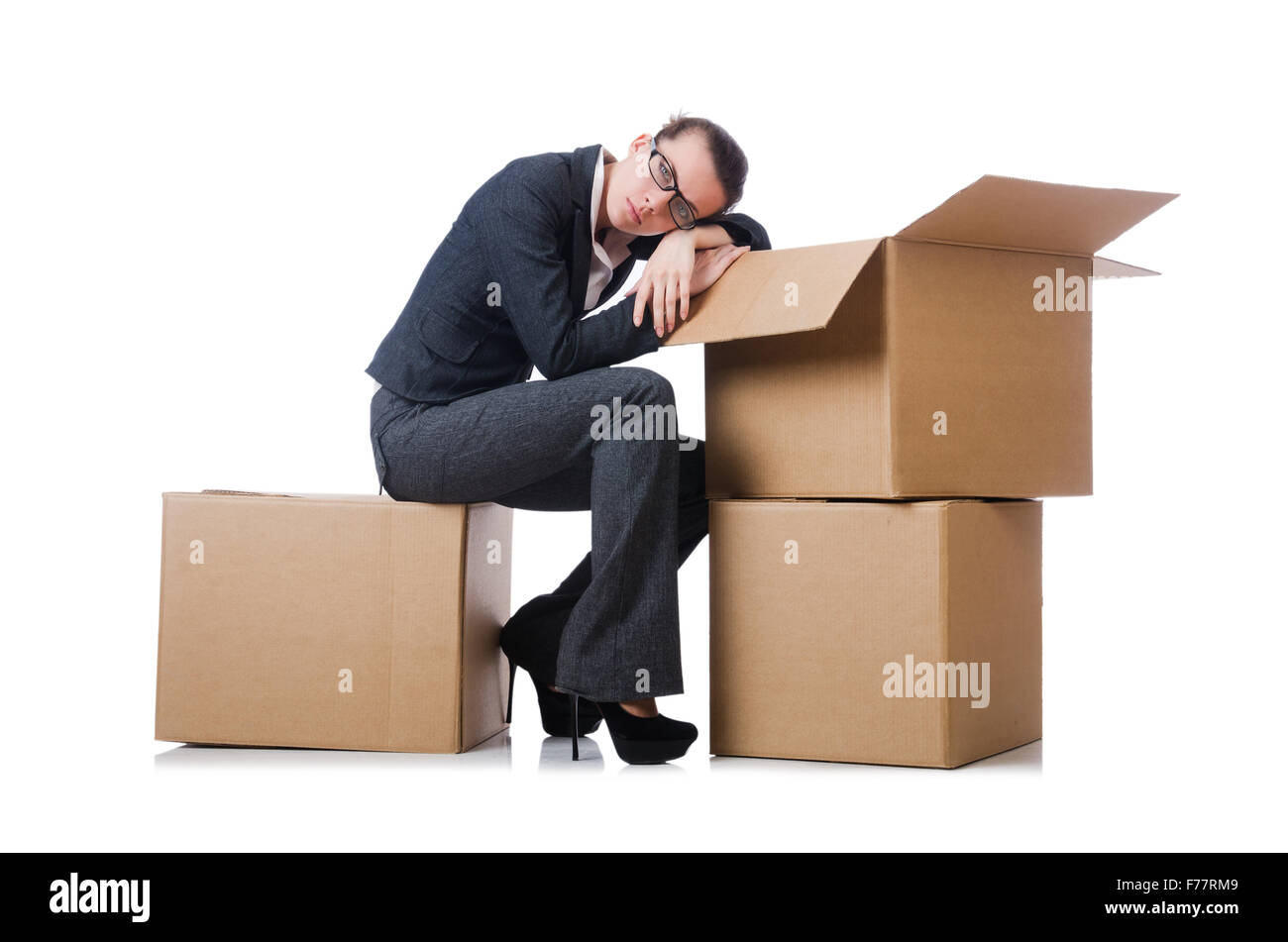Woman businesswoman with boxes on white Stock Photo - Alamy