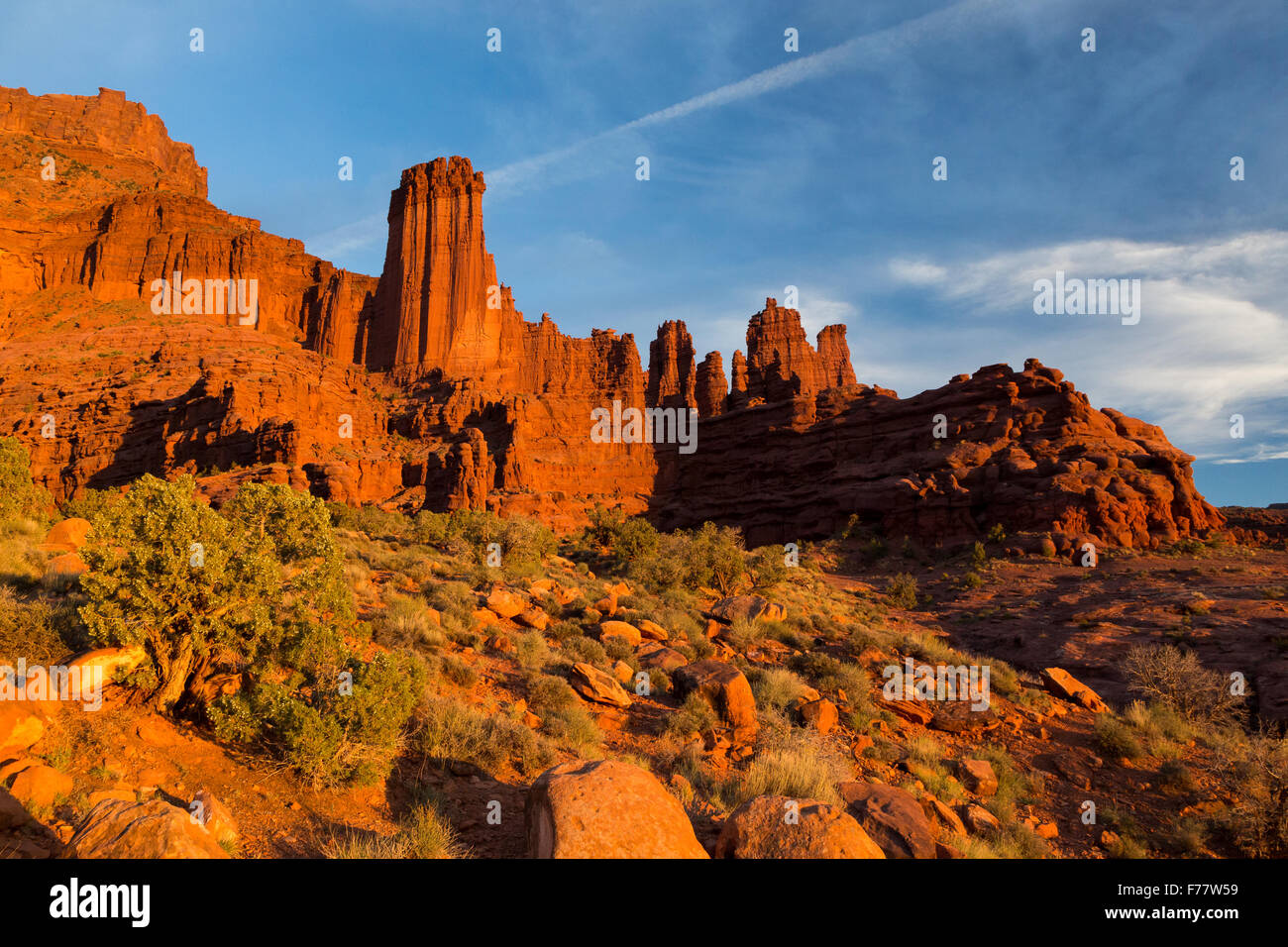 The Fisher Towers glow in sunset, Moab, Utah Stock Photo
