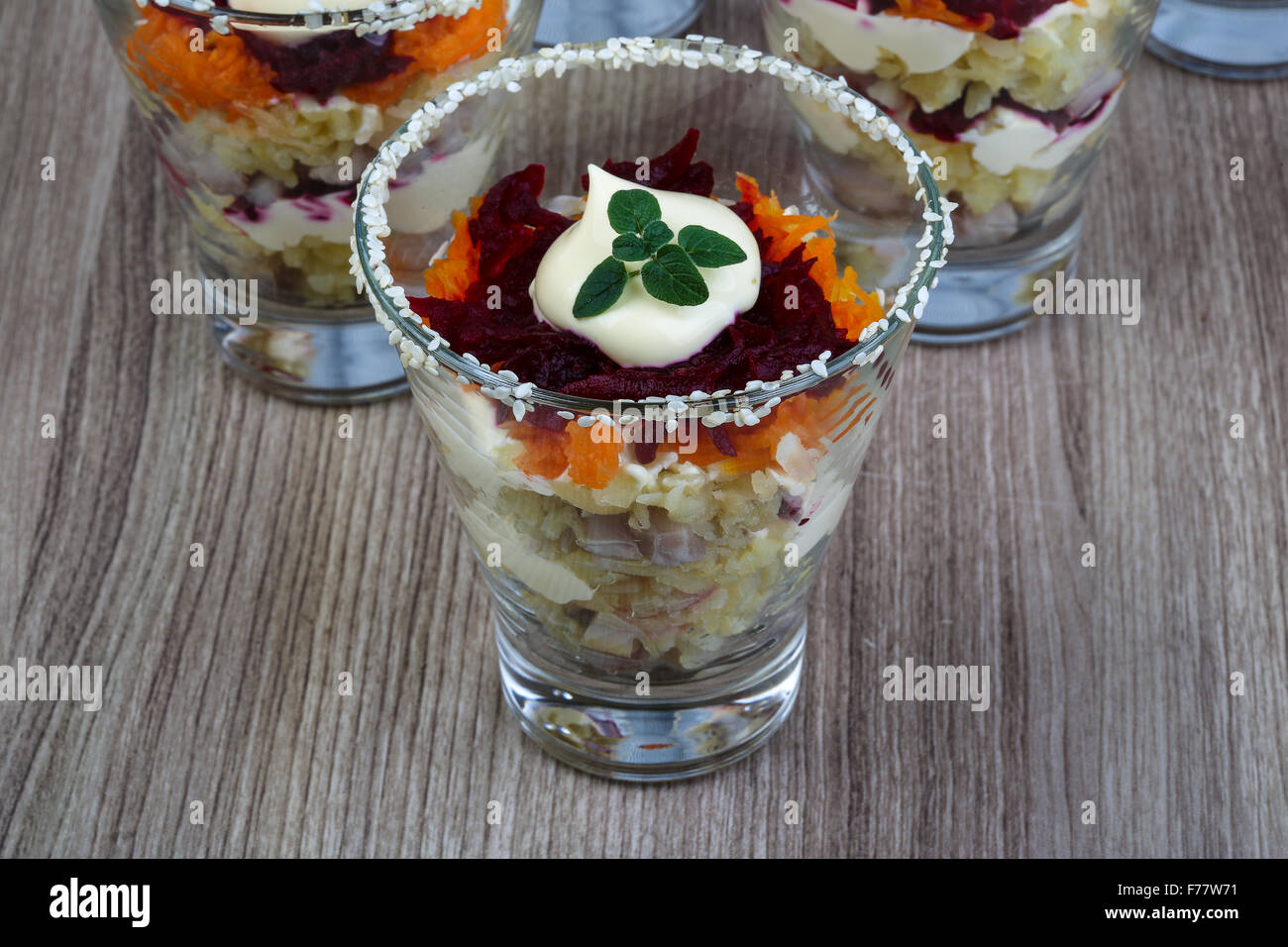 Russian herring salad with beet, potato, carrot and mayonnaise Stock