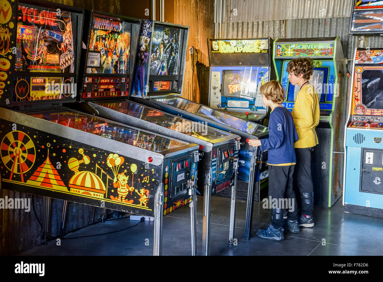 Retro amusement arcade with pinball  game machines Stock Photo