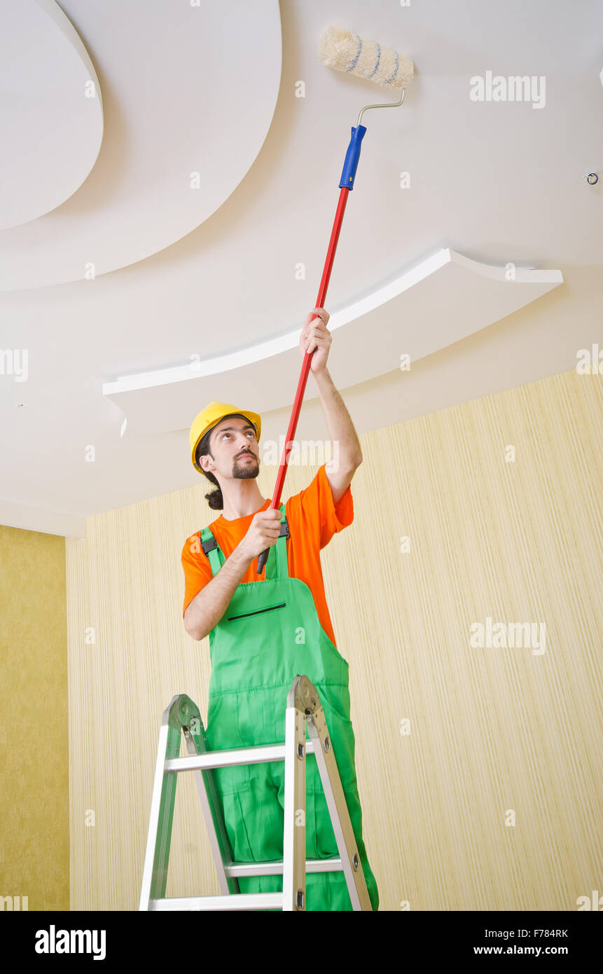 Painter worker during painting job Stock Photo Alamy
