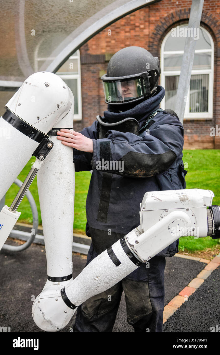 Northern Ireland. 26th November, 2015. A soldier from the Royal Logistics Corp Bomb Defusal Unit adjusts the robotic arm on a Northrop Grumman Andros Cutlass Unmanned Robotic Vehicle used to defuse and examine suspect devices. Credit:  Stephen Barnes/Alamy Live News Stock Photo