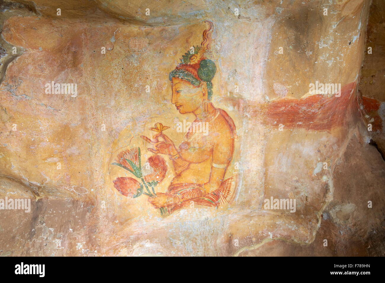 Sri Lanka - Sigiriya, ancient frescoes, cave wall paintings inside Sigiriya fortress, UNESCO World Heritage Site Stock Photo