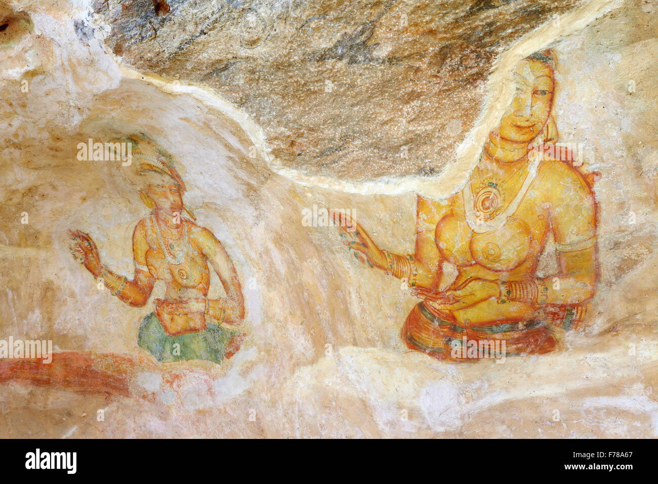 Sigiriya - ancient frescoes, cave wall paintings inside Sigiriya fortress, Sri Lanka, UNESCO World Heritage Site Stock Photo