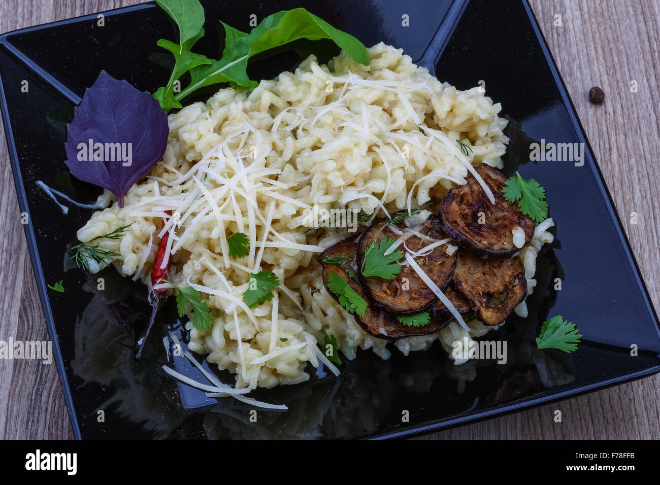 Italian trditional Risotto with eggplant and coriander Stock Photo Alamy