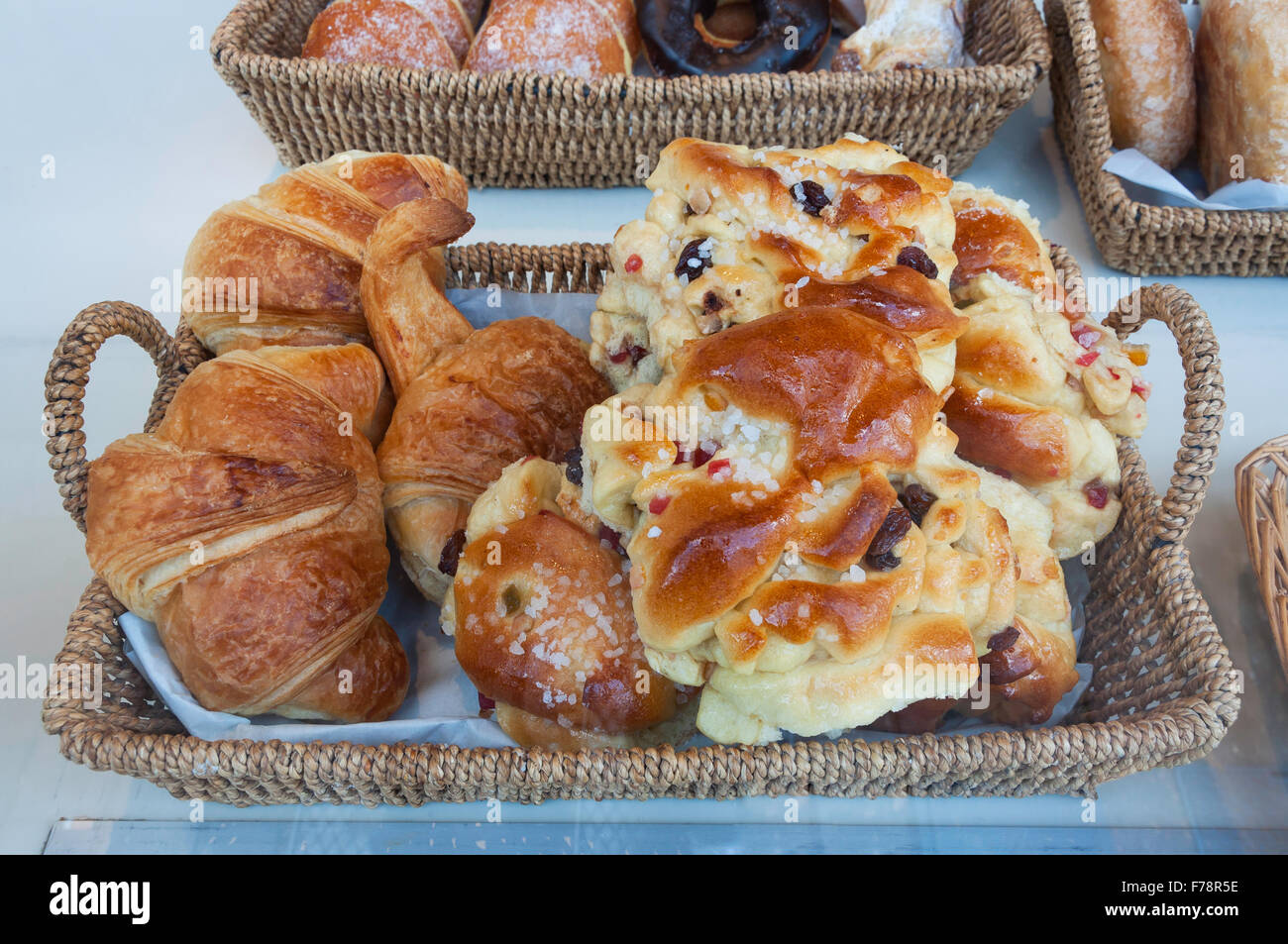 Pastries in bakery shop window, Church Street, Chalfont St Giles Buckinghamshire, England, United Kingdom Stock Photo