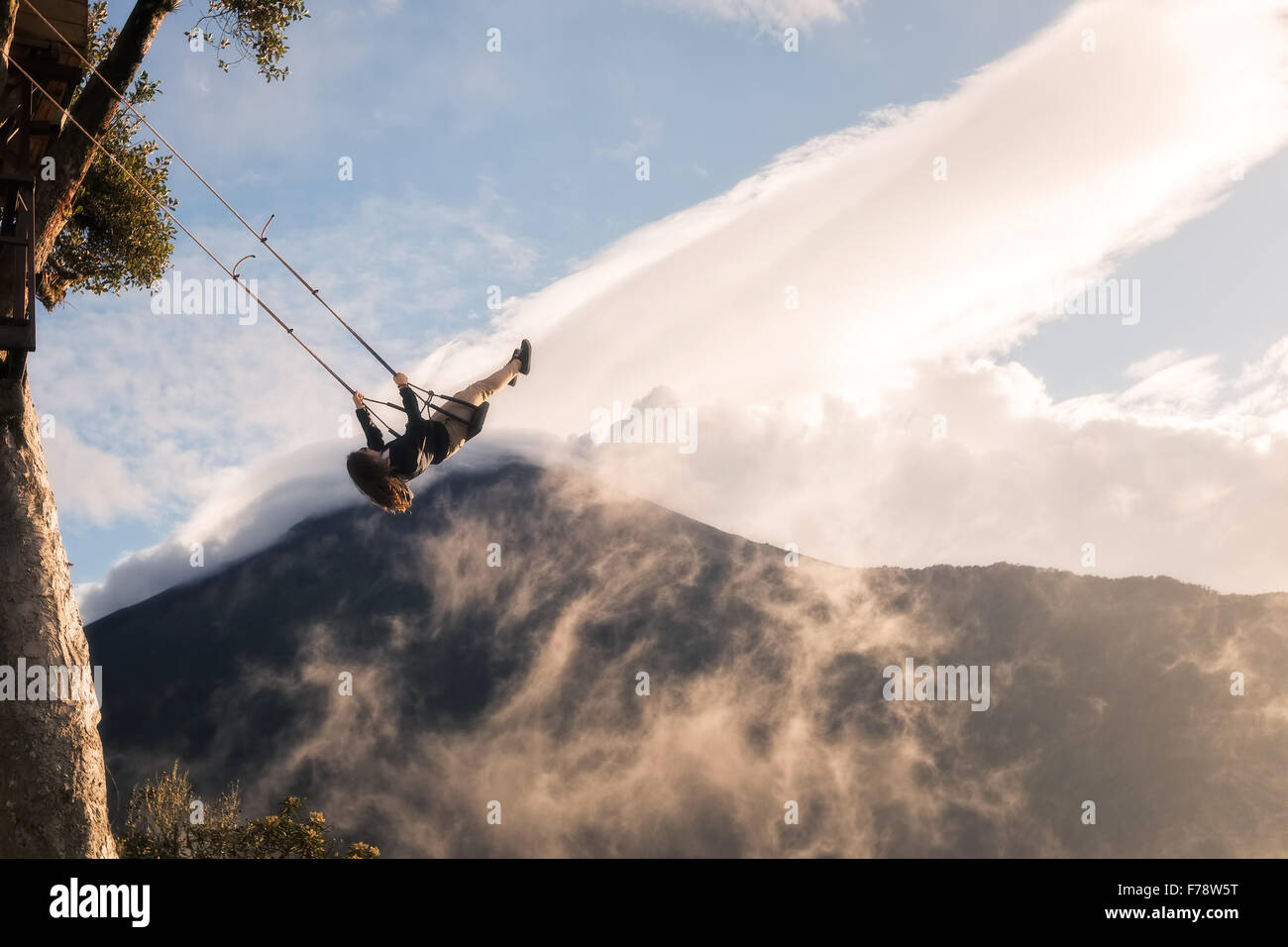 Flying Ropes Girl Banos, Ecuador - 25 November 2015: Young Girl Taking A Ride On The High ...