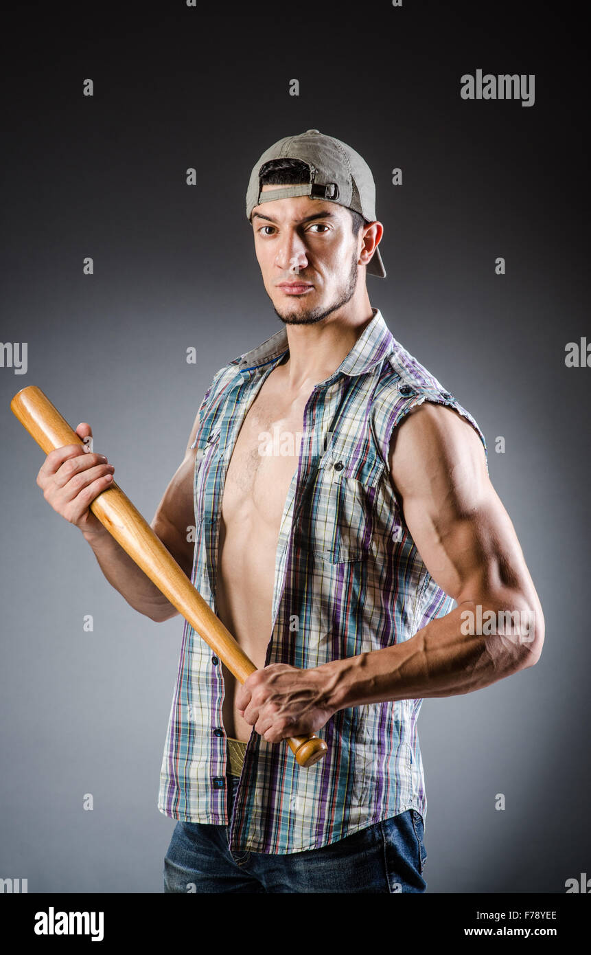 Violent man with baseball bat and hat Stock Photo Alamy