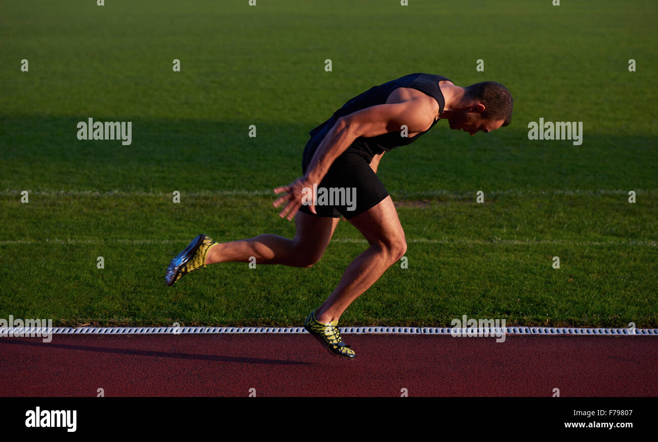 Sprinter leaving starting blocks hi-res stock photography and images ...