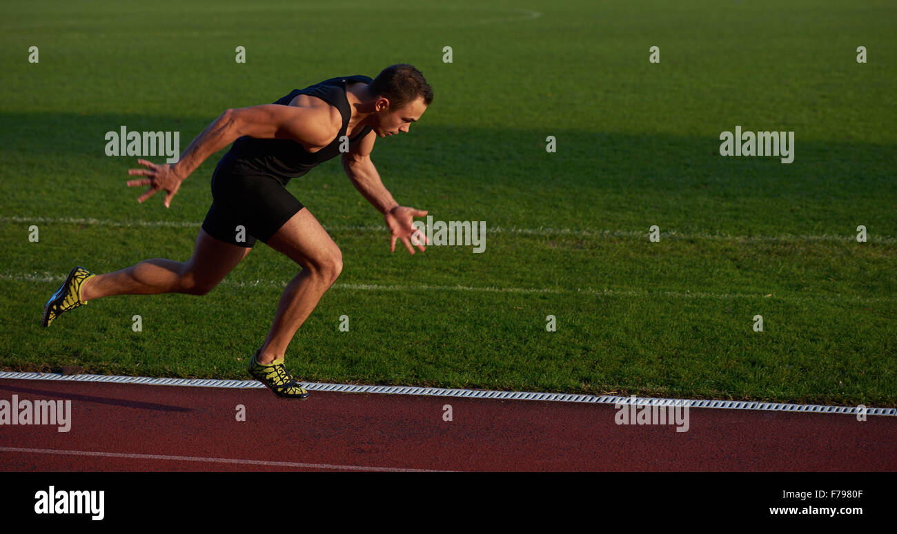 Sprinter leaving starting blocks hi-res stock photography and images ...